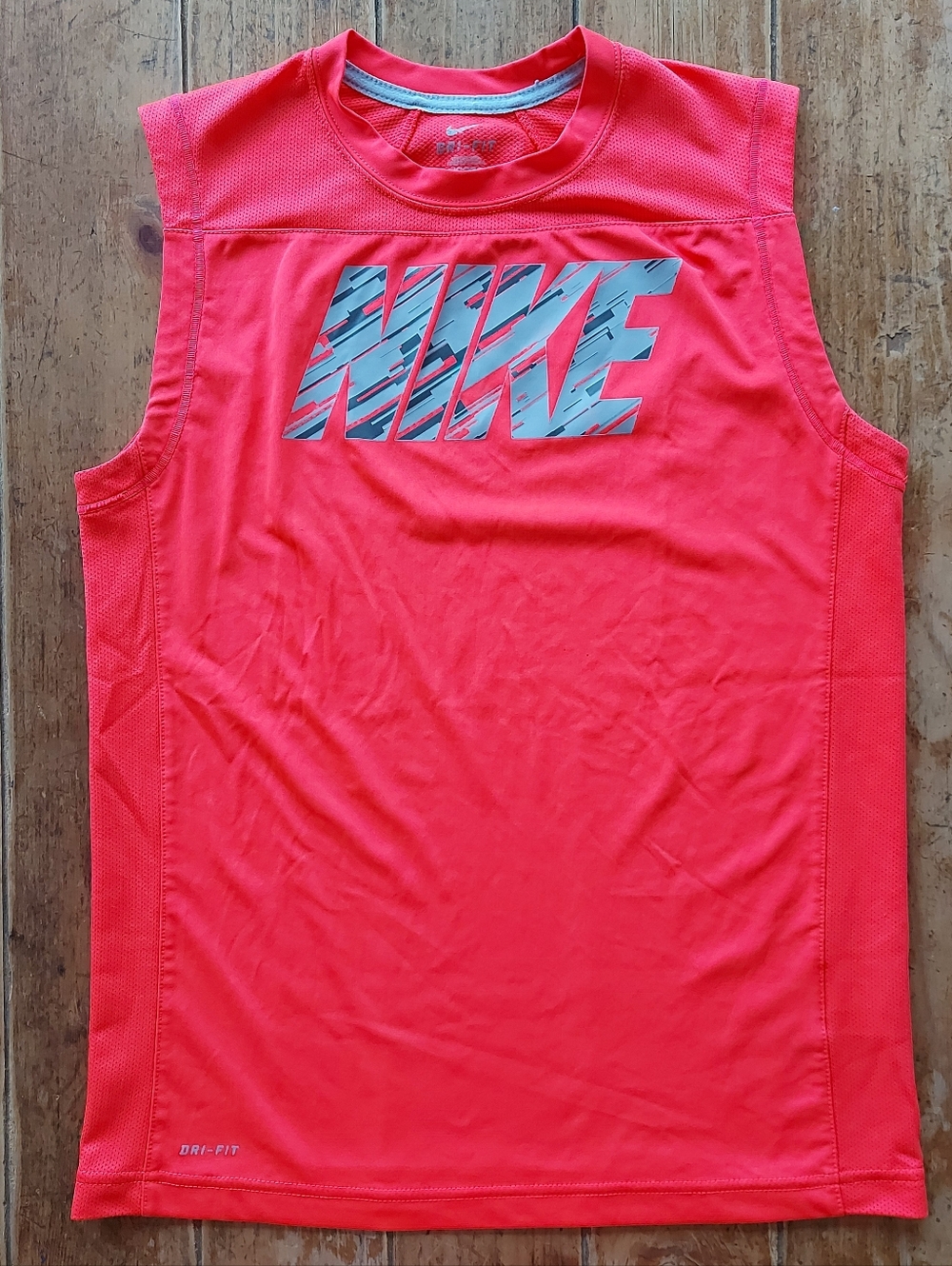 Nike Boys' Dri-FIT Sleeveless Mesh T-Shirt in bright coral, size XL